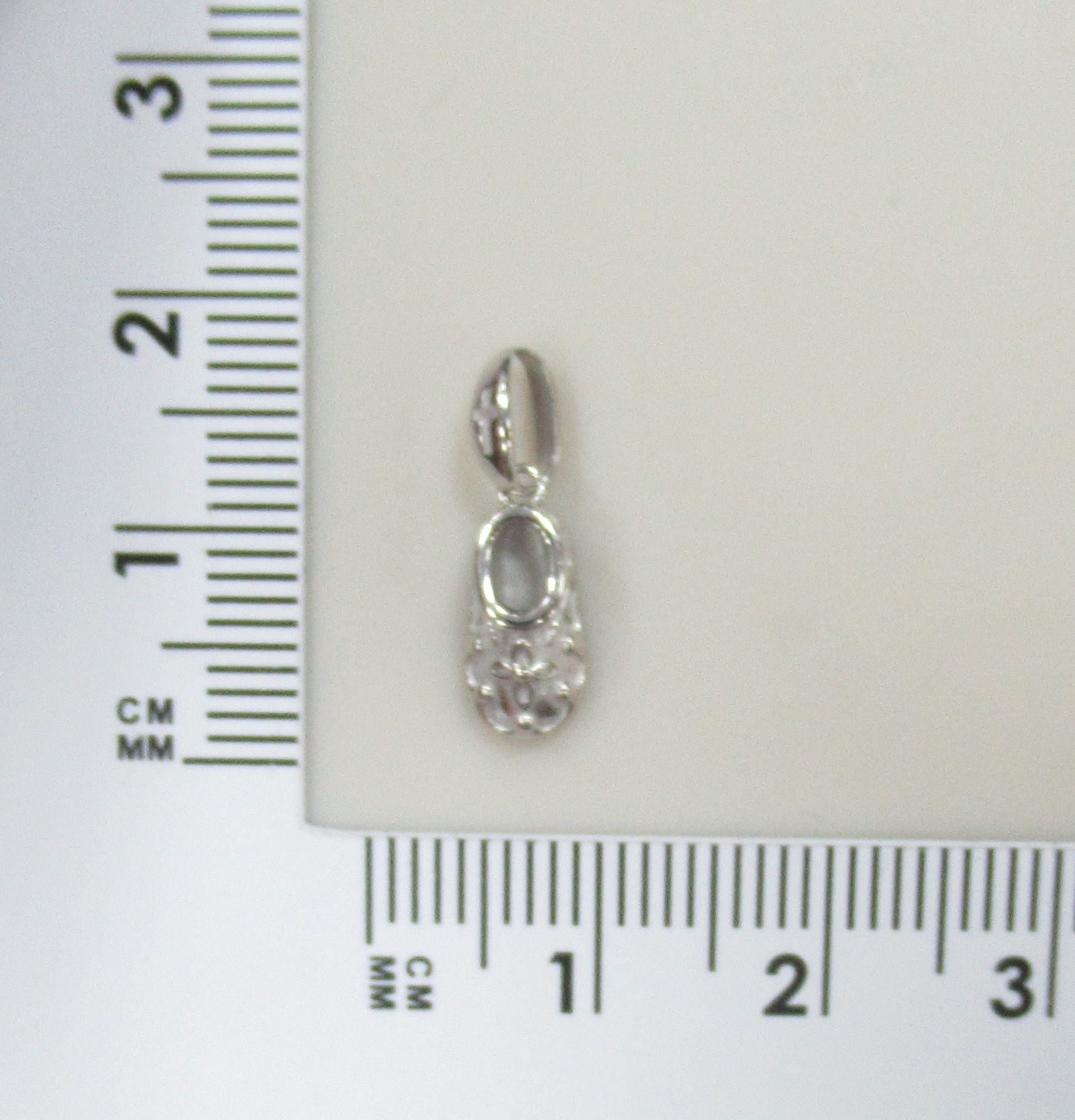 Подвеска из белого золота "Башмачок Спиридона"